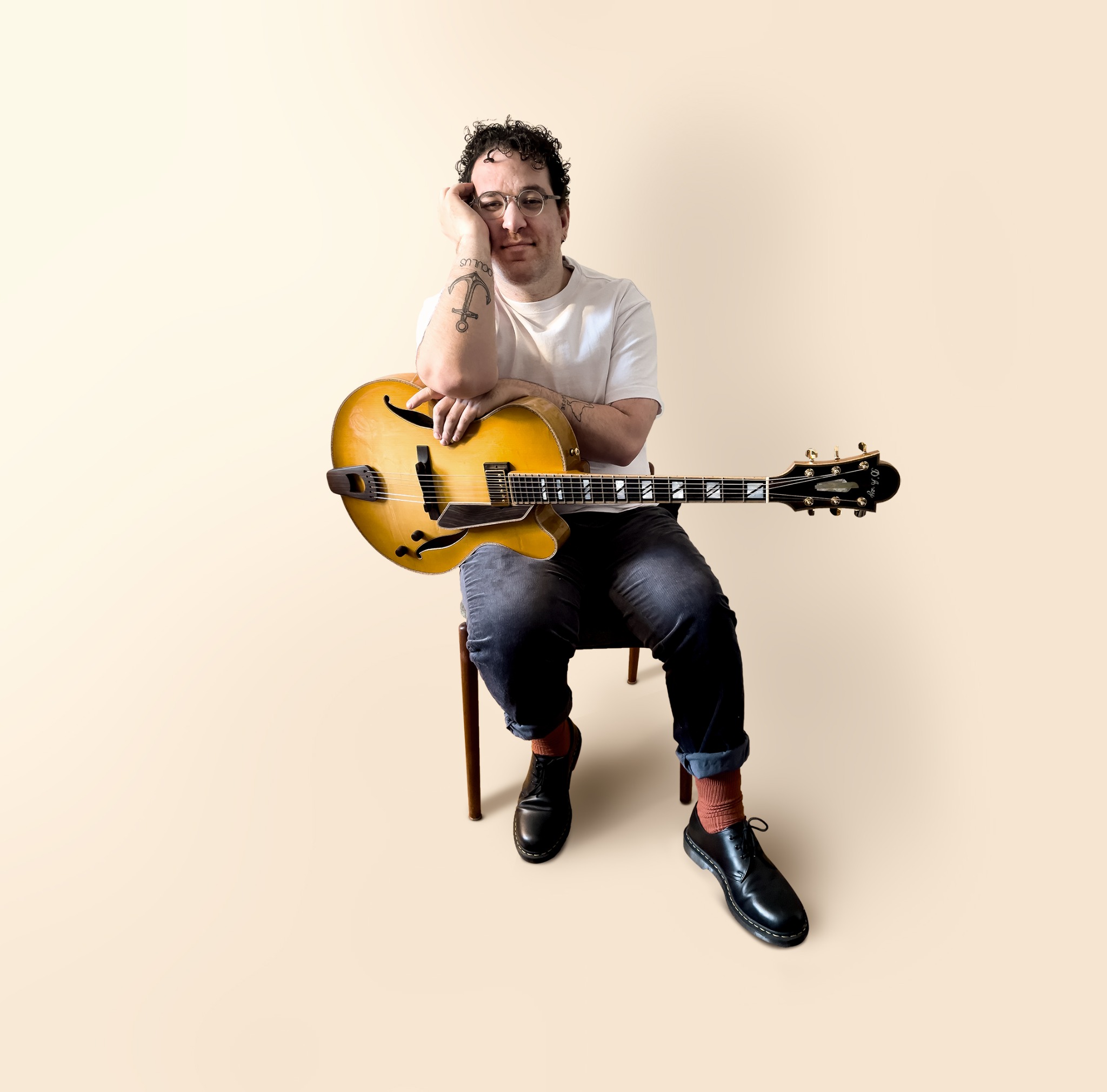 David Blake with his guitar